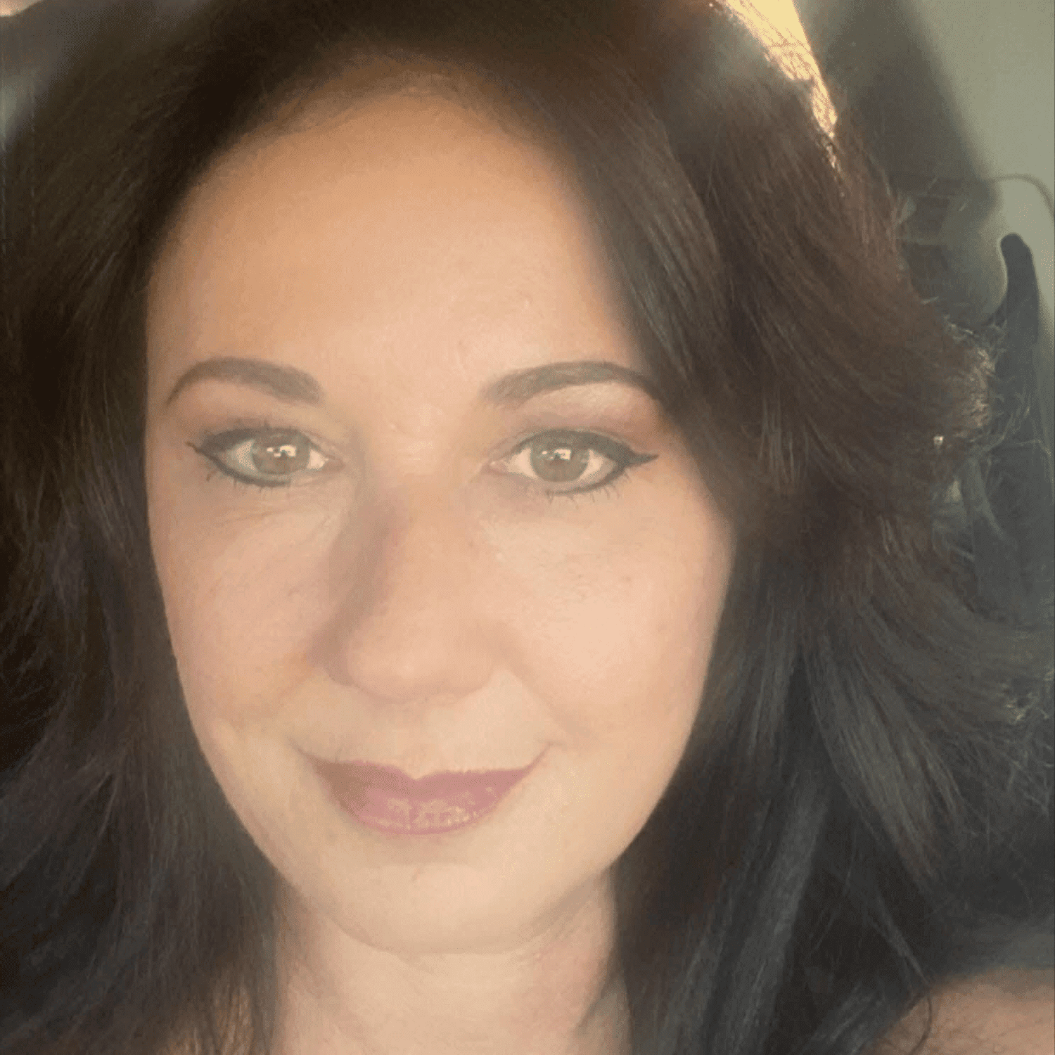 Portrait of Kristy Blitch, a professional stylist at Alluring Designs A Salon, showcasing their expertise and style.