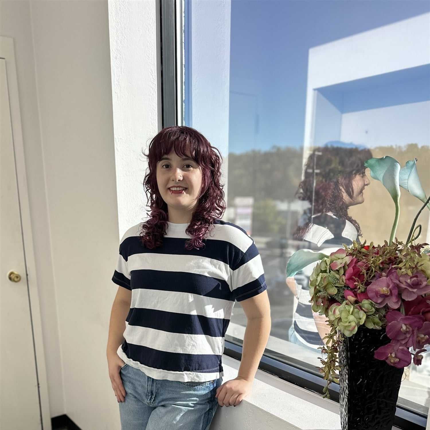 Portrait of Stephanie, a professional stylist at Alluring Designs A Salon, showcasing their expertise and style.