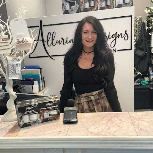 Portrait of Ashley Kern, a professional stylist at Alluring Designs A Salon, showcasing their expertise and style.