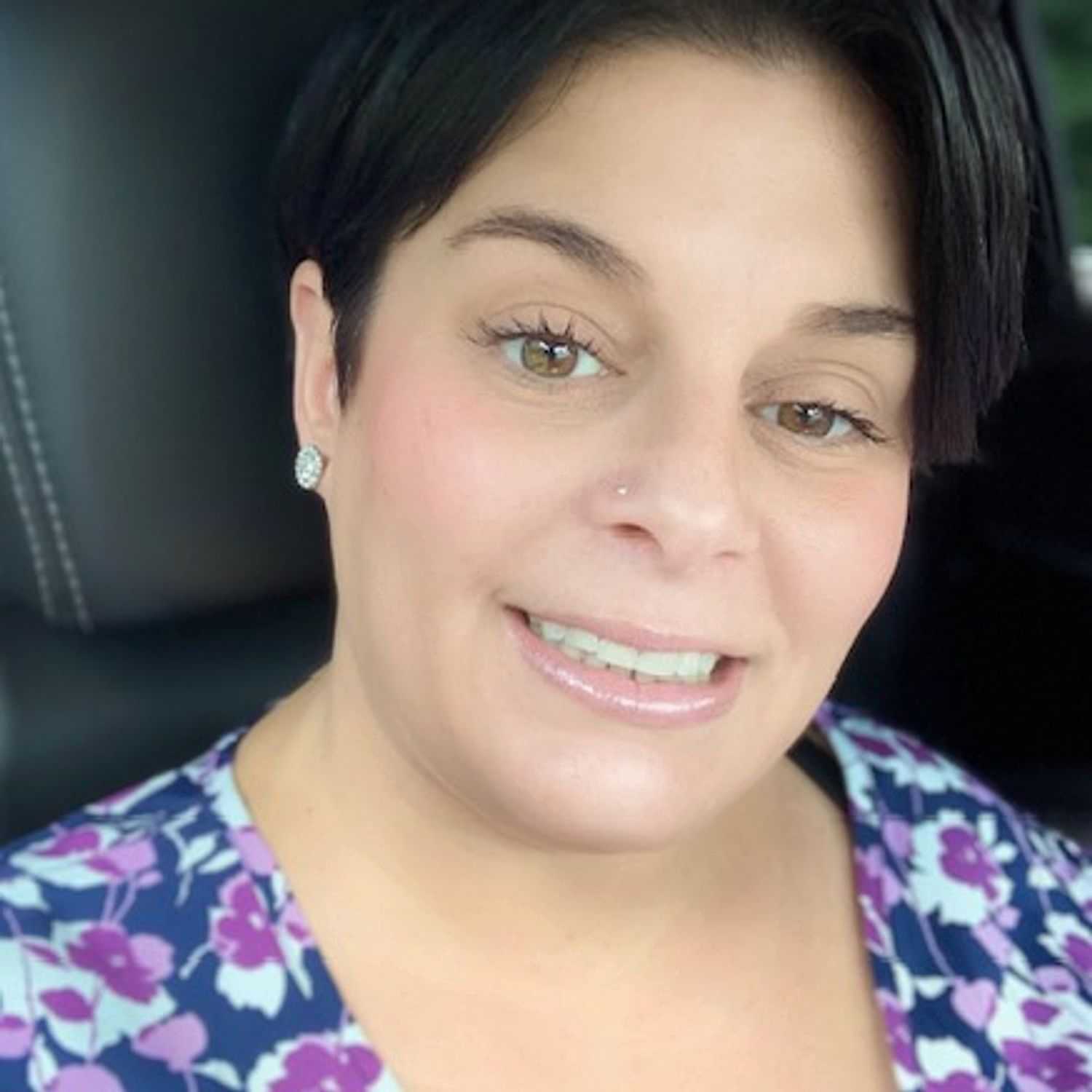 Portrait of Ashley Preece, a professional stylist at Alluring Designs A Salon, showcasing their expertise and style.