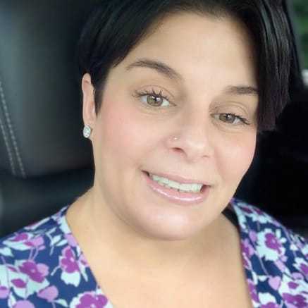 Portrait of Ashley Preece, a professional stylist at Alluring Designs A Salon, showcasing their expertise and style.